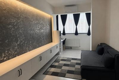 Apartament cu 2 camere semidecomandat, mobilat în UTA