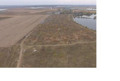 Crevedia teren intravilan de vanzare cu deschidere la lac - 1