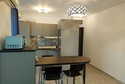 Apartament cu 2 camere semidecomandat, mobilat în Central