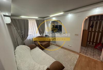 Apartament cu 3 camere semidecomandat, mobilat în Podu Roș