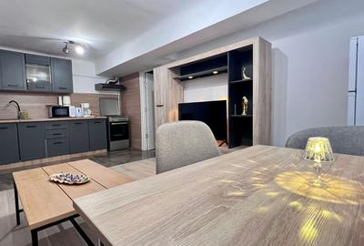 Apartament cu 2 camere semidecomandat, mobilat în Central