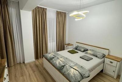 Închiriez apartament nou, 2 camere, 72 mp, cu parcare acoperită, zona Coresi TVA - 1