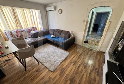 Apartament cu 3 camere semidecomandat, mobilat în Podu Roș