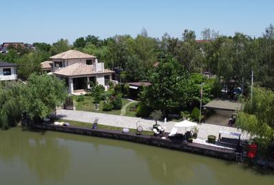 Imobil  de lux pe malul lacului cu ponton, complet mobilat si utilat - 1