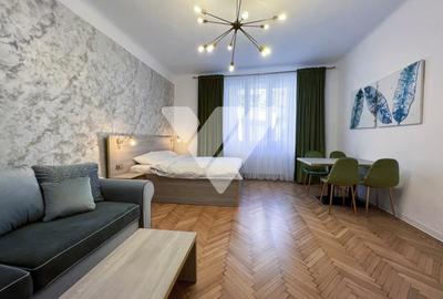 Apartament cu 2 camere semidecomandat, mobilat în Central