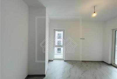 Apartament de vanzare in Sibiu - 3 camere, 2 bai, garaj, et 1-Turnisor - 6