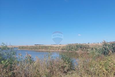 Oportunitate dezvoltare: 10.032 mp cu front la lac, lotizat - 1