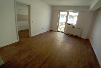 Apartament cu doua camere, decomandat, gradina, loc de parcare, boxa