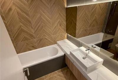 Apartament cu 2 camere decomandat în Tractorul