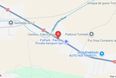 Vand teren localizat la iesirea din Iasi la intrarea in Tomesti vizavi de careta - 1