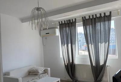 Apartament cu 2 camere semidecomandat, mobilat în 1 Mai