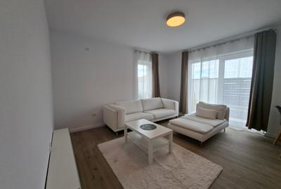 Bloc nou,  apartament   cu  parcare si curte proprie. - 2