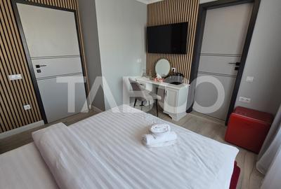 PENSIUNE de vanzare 11 camere 9 bai filigorie parcari in Turnisor - 6
