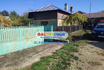 Vanzare casa batraneasca  si teren Raciu - 1