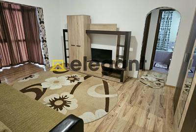 Apartament cu 2 camere semidecomandat, mobilat în Central