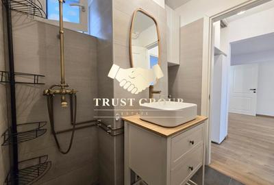 Apartament cu 3 camere semidecomandat, mobilat în P-ța Victoriei