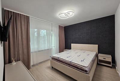 Apartament cu 2 camere semidecomandat, mobilat în Podu Roș