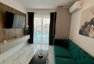 Apartament cu 2 camere semidecomandat, mobilat în Central