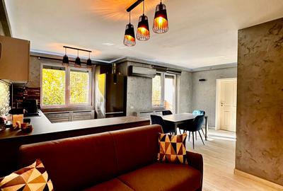 Apartament cu 2 camere decomandat, mobilat în Tractorul