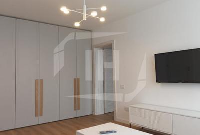 Apartament cu 3 camere semidecomandat, mobilat în Central