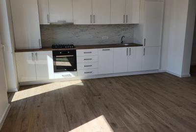 Bloc nou,  apartament   cu  parcare si curte proprie. - 4