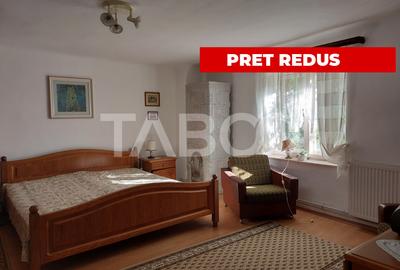 Casa de vanzare cu 2 apartamente separate si teren 500 mp Cisnadioara - 1