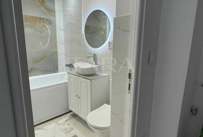 Garsonieră renovată integral în zona Farmec The Office. - 8