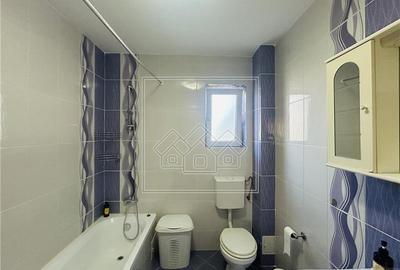 Ap spatios, 3 camere, 2 balcoane, loc de parcare , etaj 1 - Turnisor - 9