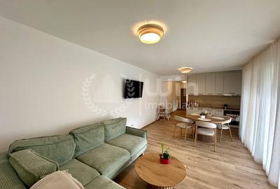 Apartament cu 3 camere semidecomandat, mobilat în Borhanci