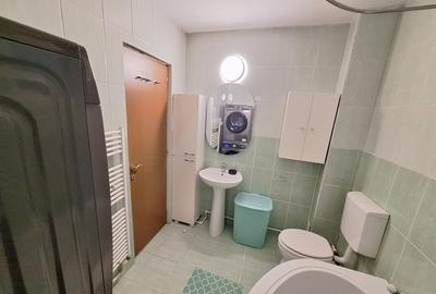 Închiriez apartament spatios cu 2 camere,parter,zona Calea Moldovei,parcare incl - 6
