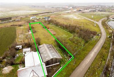 RECO . Teren intravilan cu hala metalica in Roit . - 2