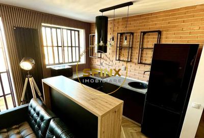Apartament cu 2 camere semidecomandat, mobilat în P-ța Amzei