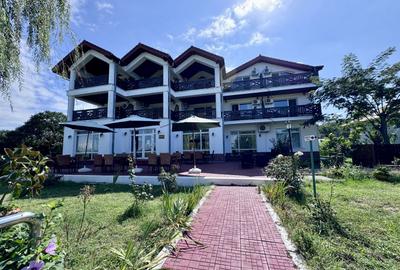 Hotel 20 camere Delta Dunarii 50 m deschidere teren 6000 mp acces auto - 6