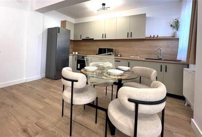 Apartament mobilat 60 mp utili la etajul 1 cu 2 camere terasa 12 mp - 4