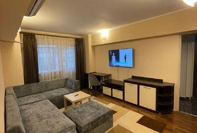 Apartament cu 3 camere semidecomandat, mobilat în Titan