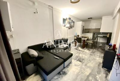 Apartament cu 3 camere semidecomandat, mobilat în Central