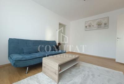 Apartament cu 3 camere semidecomandat, mobilat în Central