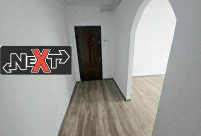 Apartament cu patru camere transformat în spațiu comercial