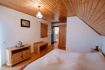 Vilă cu 6 camere, teren de 1000mp, într-un resort montan privat - 13