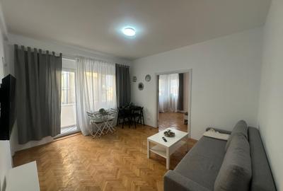 Apt. 2 camere, mobilat complet, balcon, bloc solid, langa Parcul Cismigiu