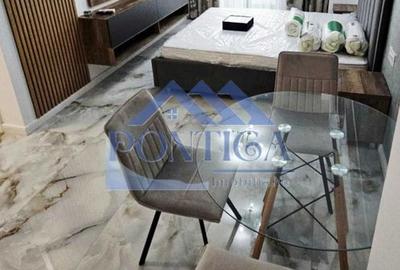 Închiriere – Studio NOU, zonă de dormit separată, bucătărie închisă - 1