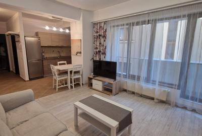 ASE -  Romana - Dorobanti -  nou - 2 camere - mobilat modern - centrala termica - 8