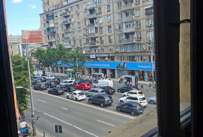 Bulevardul Magheru, Piața Romană - 11