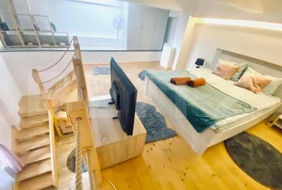 Apartament cu 18 camere semidecomandat, mobilat în Central