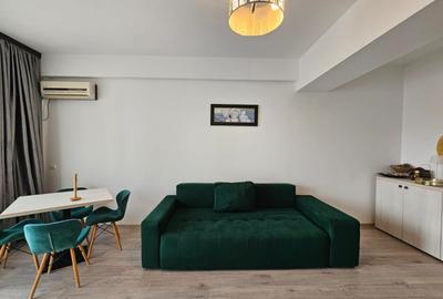 Apartament de vânzare în Summerland – vedere laterală către ac si mare - 1