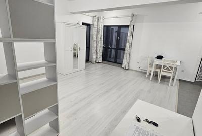 Garsoniera,48 m[ utili total.mobilata si utilata modern,loc parcare,Otopeni. - 2