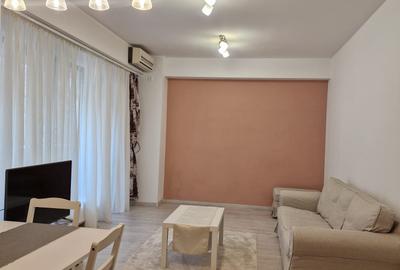 ASE -  Romana - Dorobanti - 2 camere - mobilat utilat  modern - centrala termica - 21