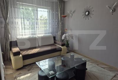 Apartament cu 3 camere semidecomandat, mobilat în Florilor