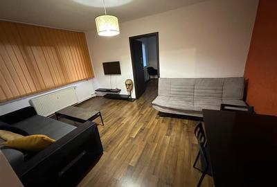 Apartament cu 2 camere semidecomandat, mobilat în Podu Roș