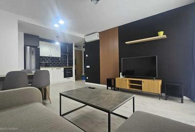 Apartament cu 2 camere semidecomandat, mobilat în Costin Georgian